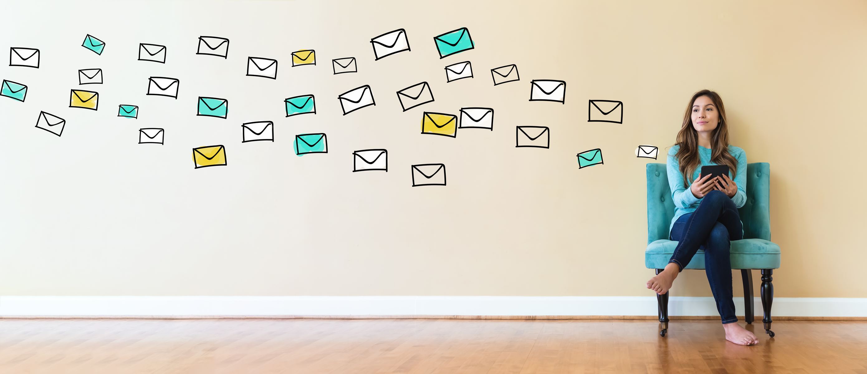 Woman using phone to email